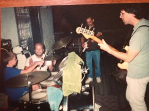 Guitarist Brad Rau at 6 years playing drums.  His father Paul Rau is on the bass.  Bill Tinari on guitar.  David Moriga helping me keep the beat on the drums. 