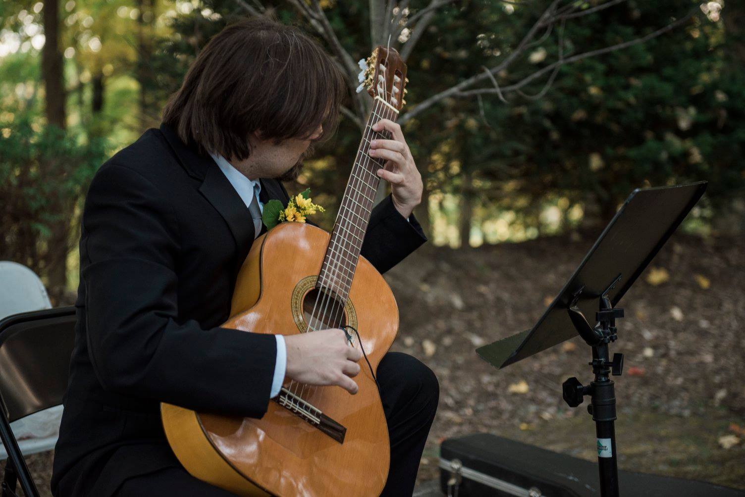 Brad Rau classical guitar performing at wedding at Stroudsmoor Country Inn